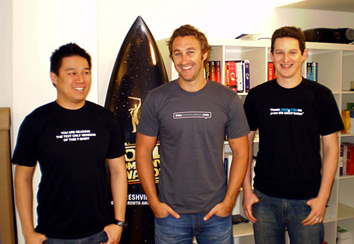 Ken, Dave and Mat in front of our 'Cool Company' surfboard
